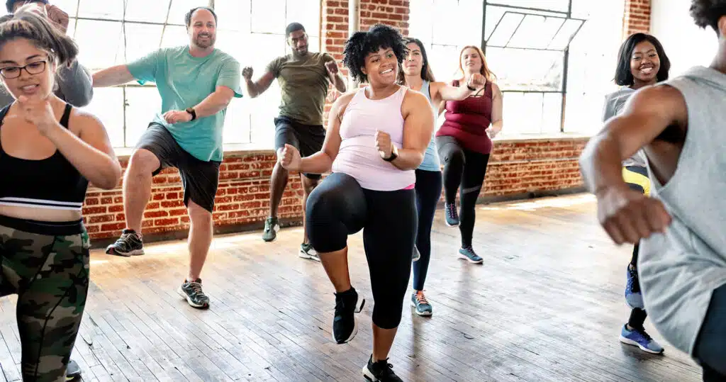 Adults have fun in a dance class