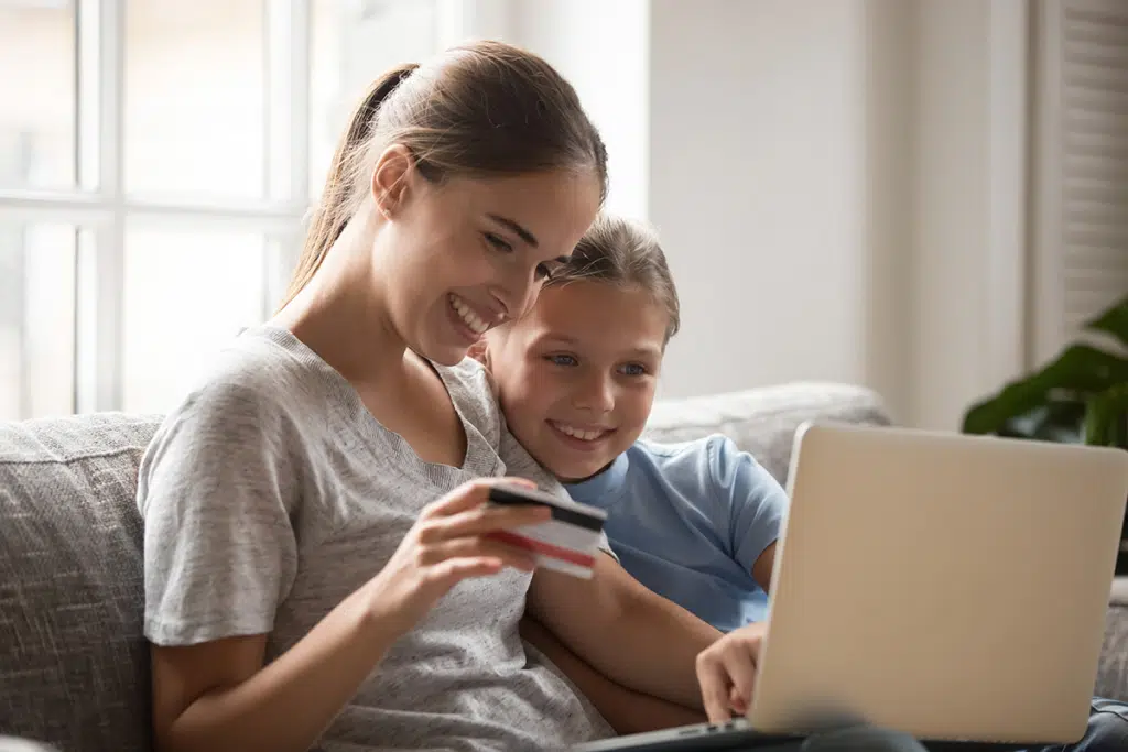 a person paying on the computer