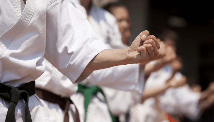 a karate student making a fist