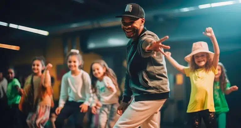 GUY DANCING WITH KIDS