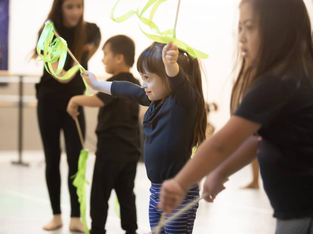 Children with special needs participating in a dance class