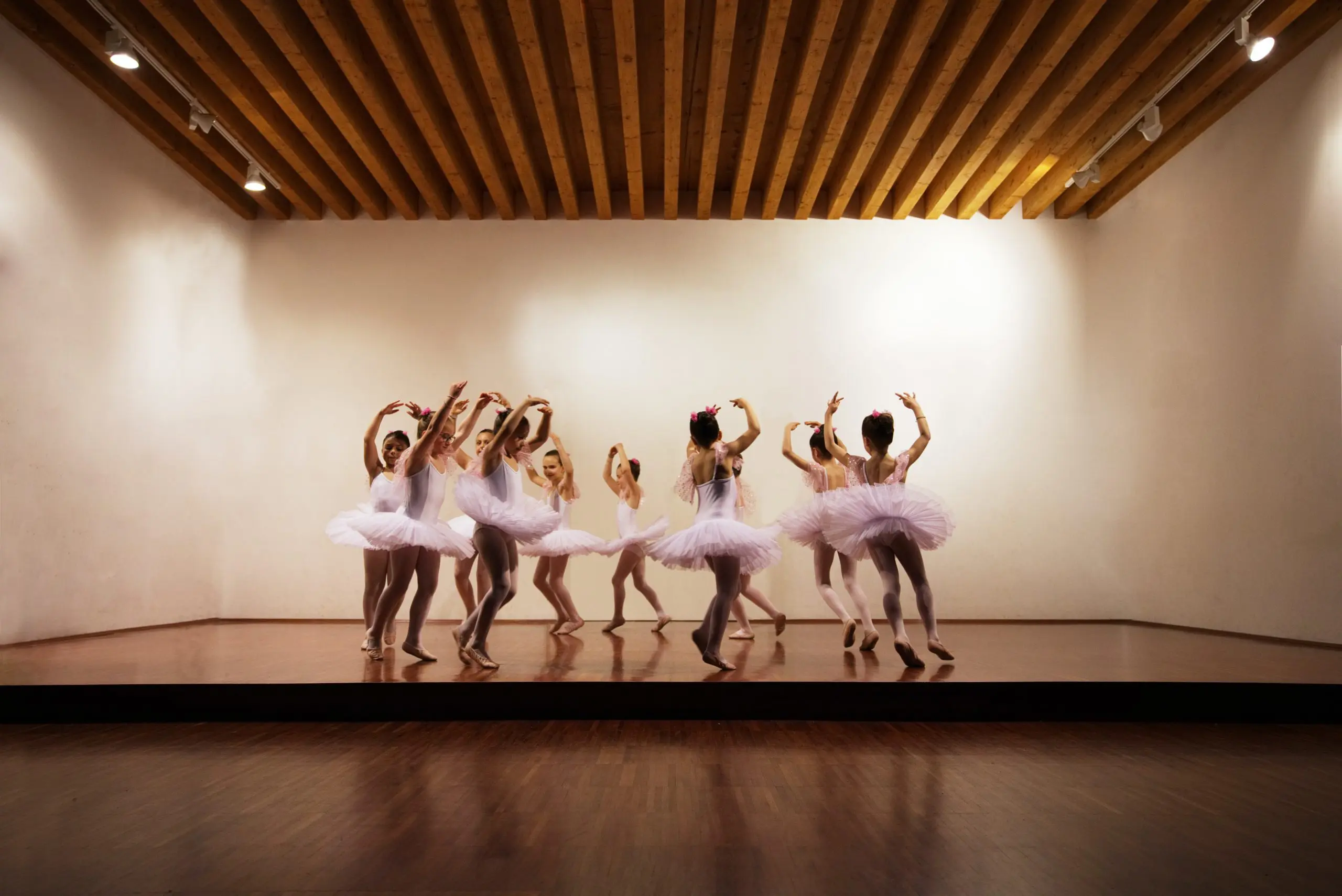 ballet class practicing in a dance studio