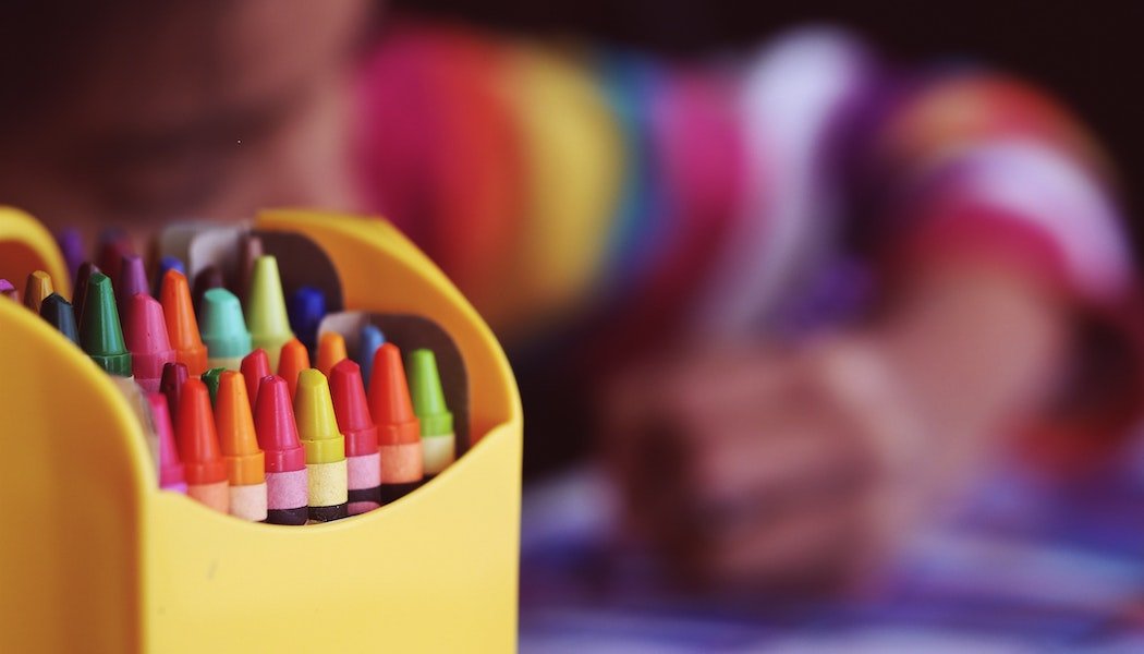 a child using crayons