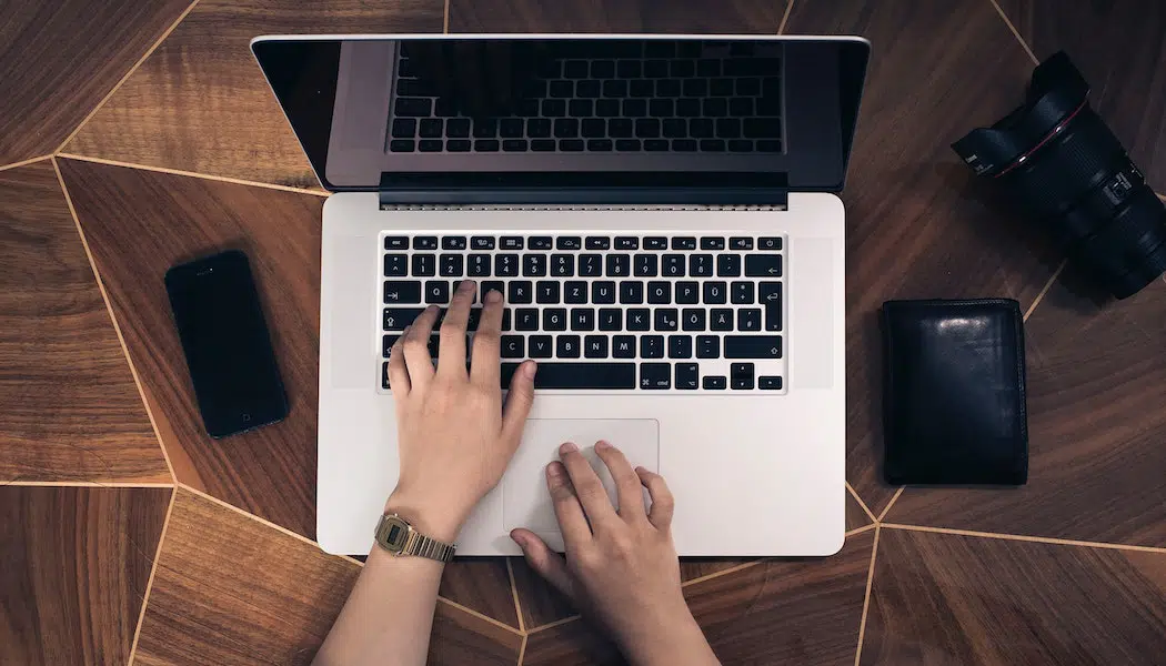 a person typing on a computer