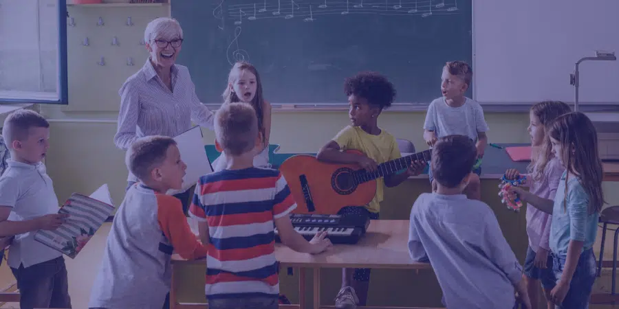 kids playing music in a class