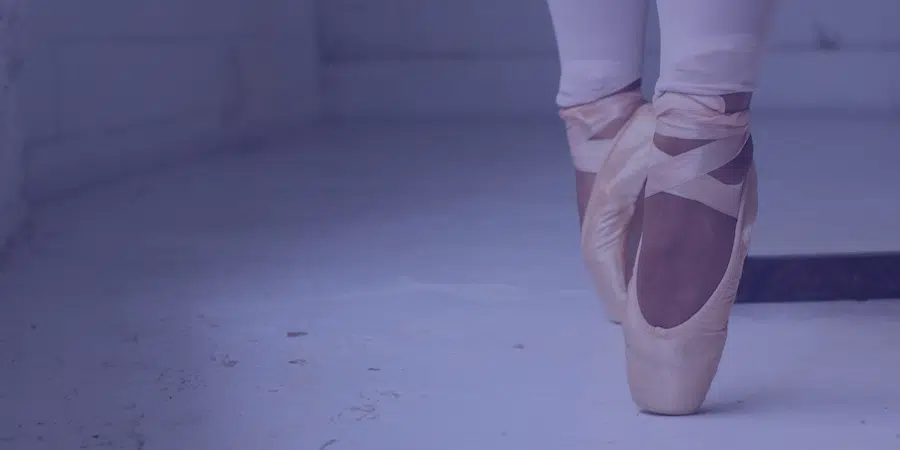 ballet slippers standing on the tippytoes